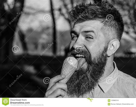 Man With Long Beard Licks Ice Cream Close Up Bearded Man With Ice