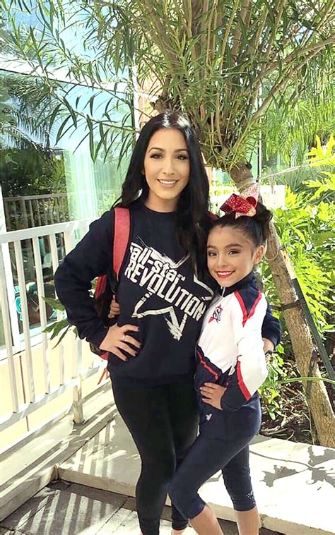 Cheerleading coaches go wild on sidelines as squad nails 1st-place