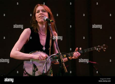 Gillian Welch Performing With Supporting Vocals And Guitar By David