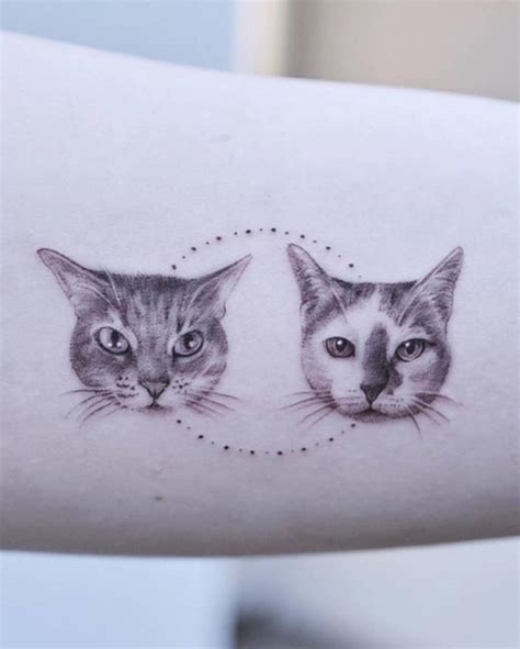 Micro Realistic Cats Tattooed On The Inner Arm