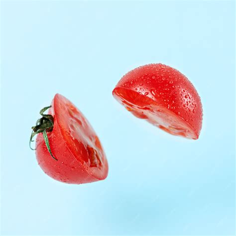 Premium Photo Sliced Tomato With Levitation Effect