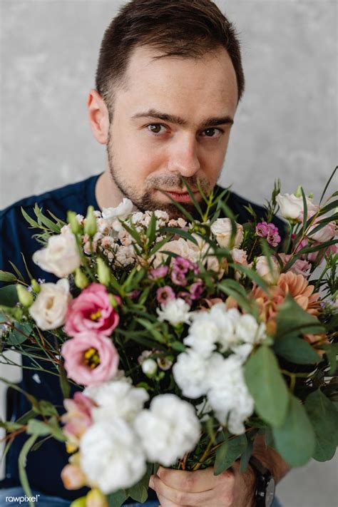 Man Holding A Bouquet Of Flowers Premium Image By