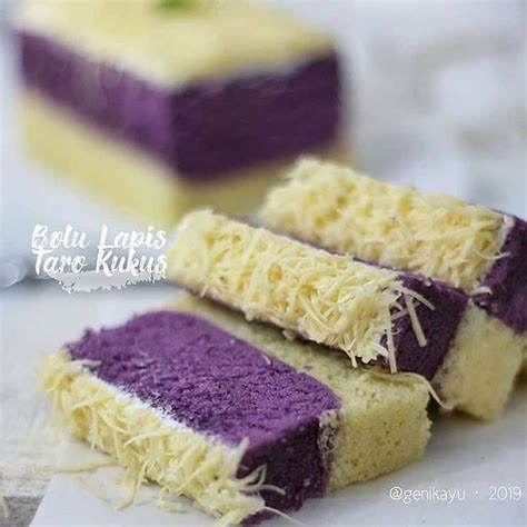 Two Pieces Of Cake That Are Purple And White