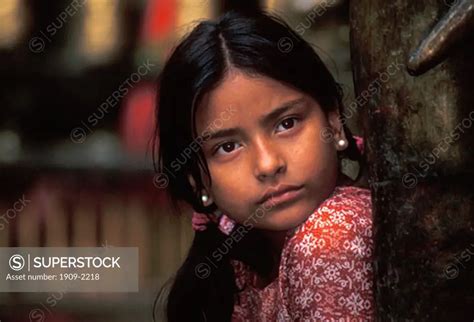 Beautiful Nepali Girl Gazes Wistfully In Kathmandu Nepal Asia Superstock