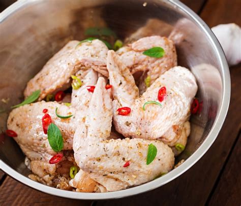 Free Photo Raw Marinated Chicken Wings Prepared In Asian Style With