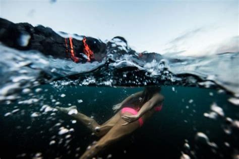 Adventurous Surfer Swims Near Erupting Volcano In Hawaii | Others