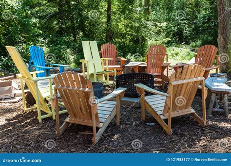 Colorful Adirondack Chairs Around Fire Pit Stock Image - Image of view ...