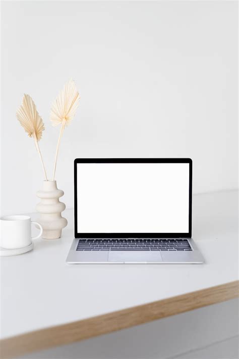 A Laptop with White Screen · Free Stock Photo