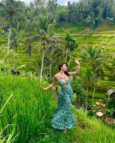 Beautiful Photoshoots Of Indah Kalalo In The Rice Fields Hot With High Slit Dresses And