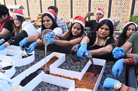 Cake Mixing Ceremony Celebrated In Traditional Style परंपरागत स्टाइल