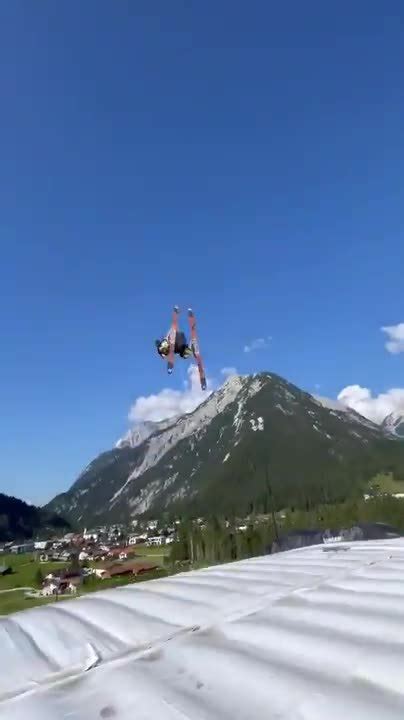 Guy Performs Amazing Triple Flip Mid Air After Launching Off Of A Slope