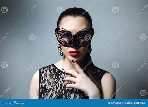 Beautiful Woman With Black Lace Mask Over Her Eyes Red Lips And Nails