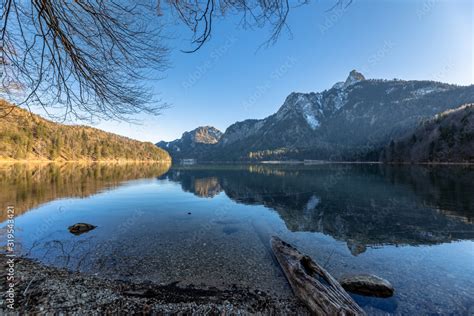 Stunning view of the Alpsee lake in winter with the Neuschwanstein and ...