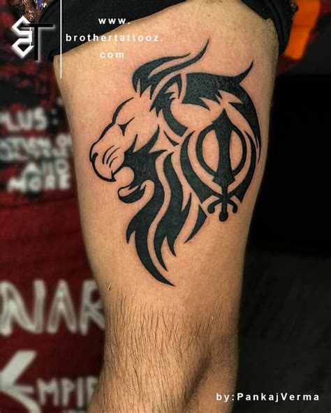 Lion With Khanda Tattoo Small Tattoos For Guys Lion Tattoo Design