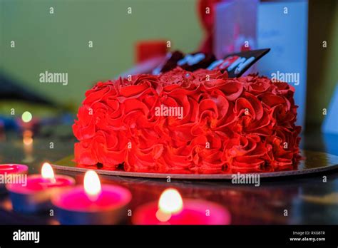 Red velvet birthday cake with candles hi-res stock photography and ...