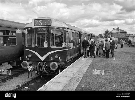 Passengers Board A Train At Leeming Bar Railway Station Wensleydale