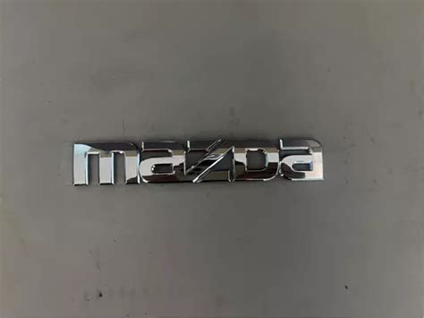 Emblema Mazda Para Cajuela Original Y Nuevo Mercadolibre