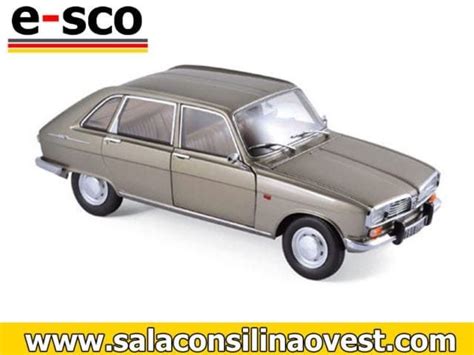 An Old Model Car Is Shown On A White Background With The Words E Sco