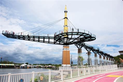 Premium Photo | Skywalk bridge stretching parallel to banks of Khwae ...