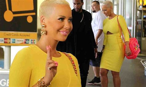 Amber Rose Flashes Some Underboob In Super Tight Yellow Dress Daily Mail Online