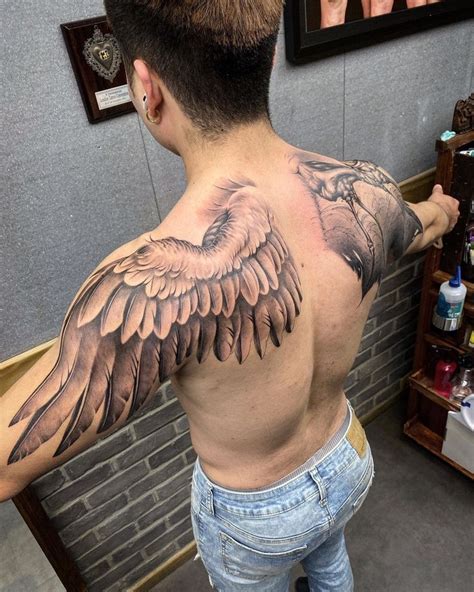 Pin by Zee Tattoo on Eagle | Back tattoos for guys, Wing tattoos on ...