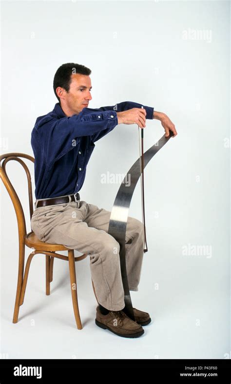 musical saw being played Stock Photo - Alamy