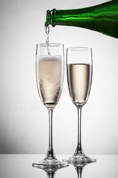 Champagne Pouring Into Glass On White Stock Image Image 30150111