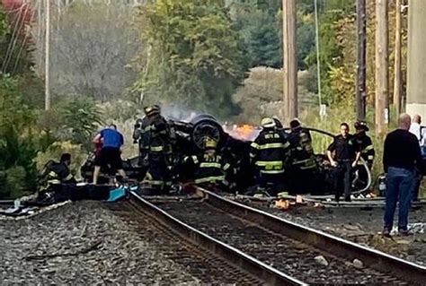 2 Teens Die When Car Falls Onto Nj Transit Tracks Catches Fire