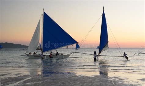 Paraw The Traditional Filipino Sailing Boat At Dusk White Beach