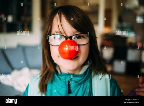 Portrait Of Girl Wearing Clown S Nose Stock Photo Alamy