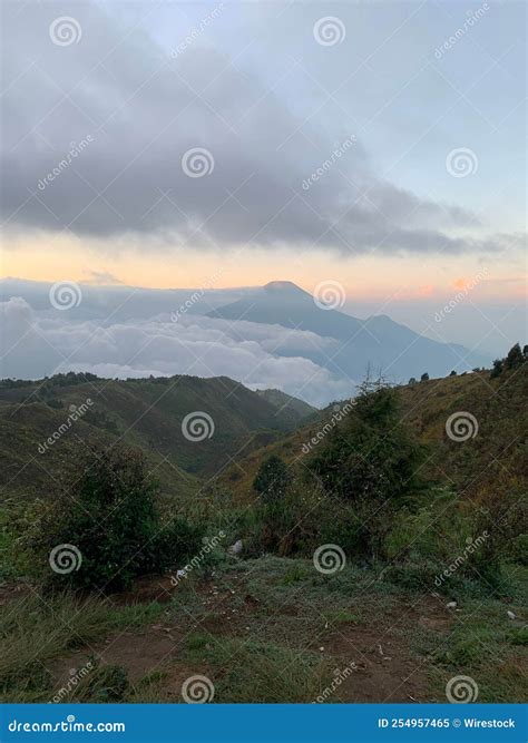 Vertical View Of Mount Prau With Mount Sindoro And Mount Sumbing In The