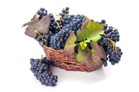 Premium Photo | Grapes in basket isolated