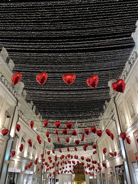 The Inside Of A Building Decorated For Valentine S Day With Red Hearts