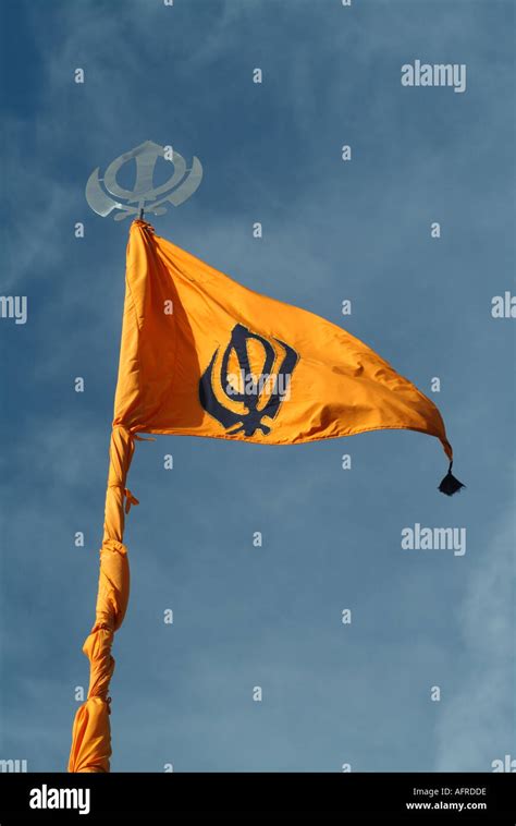 Sikh Flag Or Nishan Sahib Flying Outside A Sikh Temple Or Gurdwara