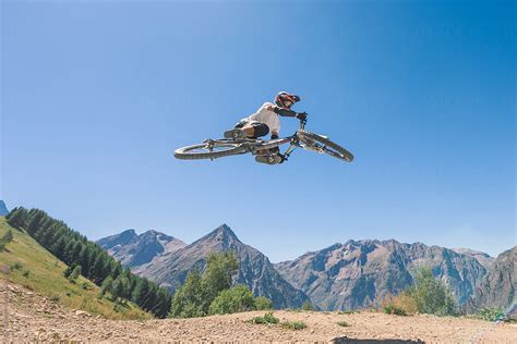 "Man Performing Midair Stunts With Mountain Bike" by Stocksy ...