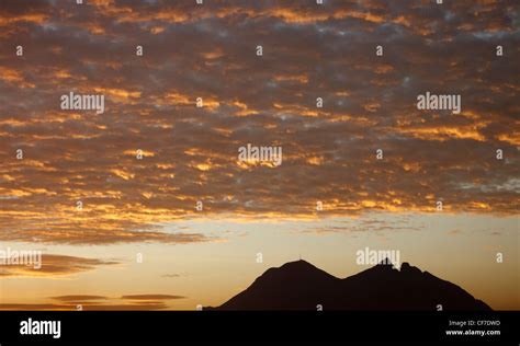 Cerro de la Silla (Horse Saddle Mountain) during golden sunrise in ...