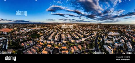 Aerial Panorama Of A Housing Community In Gilbert Arizona As The Sun