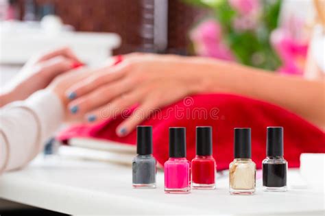 Woman Receiving Manicure In Nail Salon Stock Image Image Of Girl