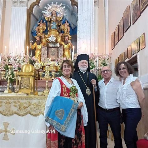 Three People Posing For A Photo In Front Of A Church Alter With The