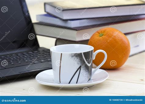 Cup Of Coffee Books Laptop And Orange Stock Photo Image Of Paper