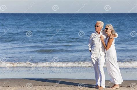 Happy Senior Couple Embracing On Tropical Beach Stock Image Image Of