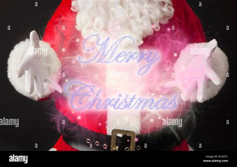 Santa claus with hologram Stock Photo - Alamy