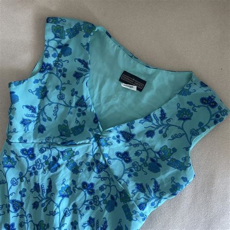 blue floral midi dress with ruffle sleeves and... | Depop