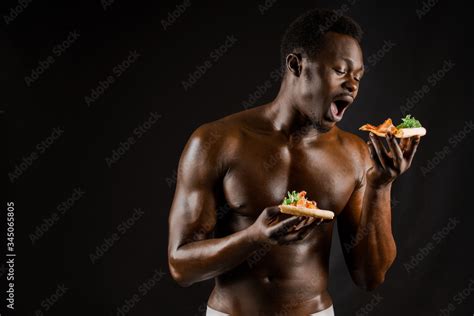 Black Handsome Naked Man Eats A Pizza Safety Food Delivery For People