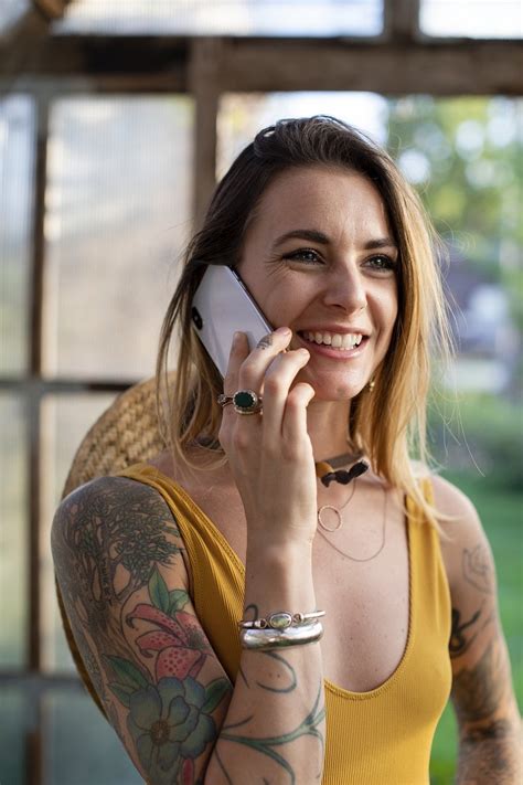 Cheerful Woman Taking Phone Premium Photo Rawpixel