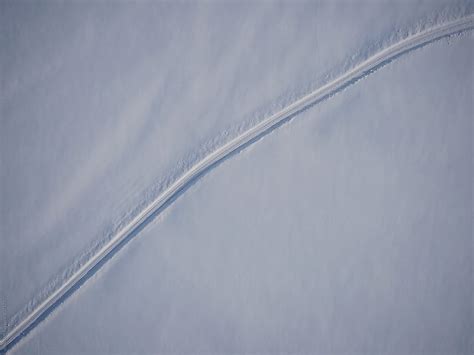 "Winter Road From Above" by Stocksy Contributor "Rolfo" - Stocksy