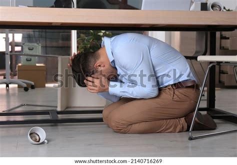 Scared Man Hiding Under Office Desk Stock Photo 2140716269 Shutterstock