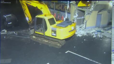 Thieves Use Backhoe To Heist Atm Youtube