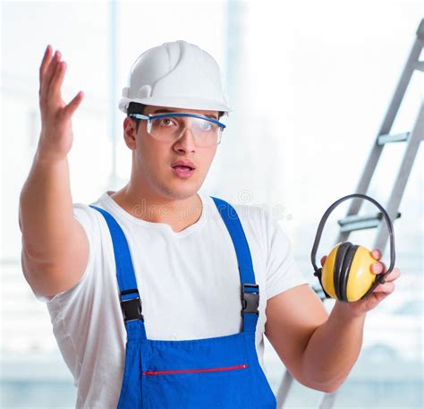 Young Worker with Noise Cancelling Headphones Stock Image - Image of ...