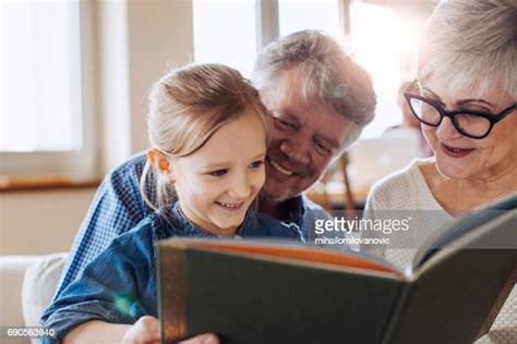 Grandpa Reading To Kids Photos And Premium High Res Pictures Getty Images